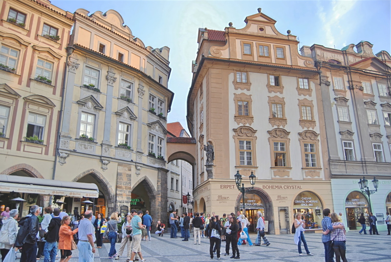 10 - The historic Old Town Square in Prague, Czech Republic, featuring traditional baroque and gothic architecture with crowds of visitors